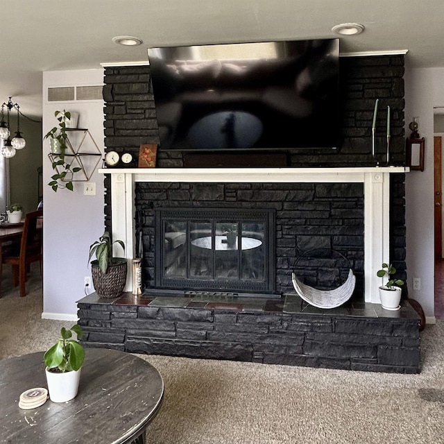 613 E Rolston, Linden, MI 48415 - details featuring a stone fireplace and baseboards