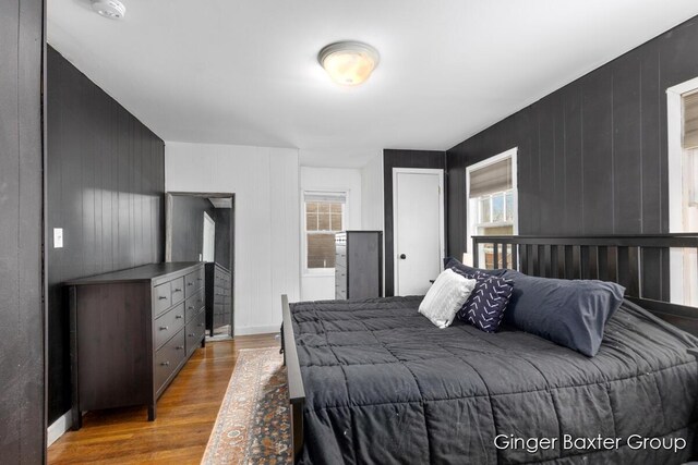 bedroom with wood finished floors