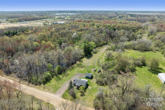 drone / aerial view with a forest view