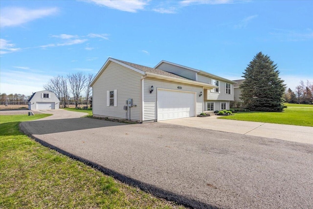 view of side of home featuring a yard