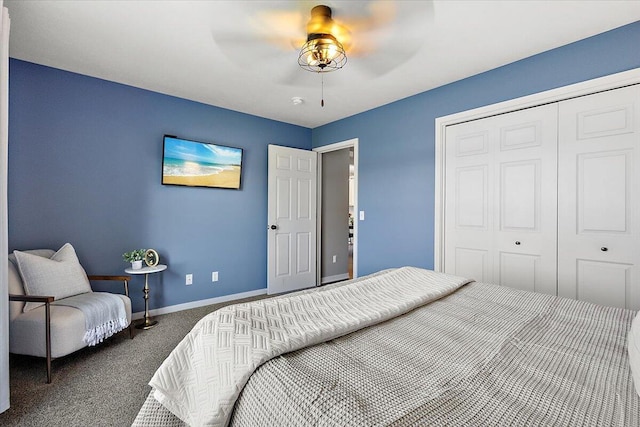 carpeted bedroom with baseboards, a ceiling fan, and a closet
