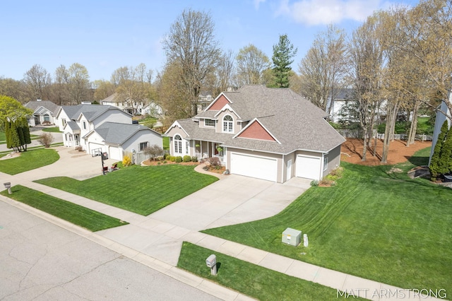 traditional home featuring concrete driveway, a garage, a shingled roof, and a front lawn
