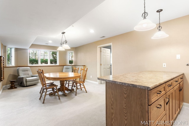 dining space with baseboards, recessed lighting, visible vents, and light colored carpet