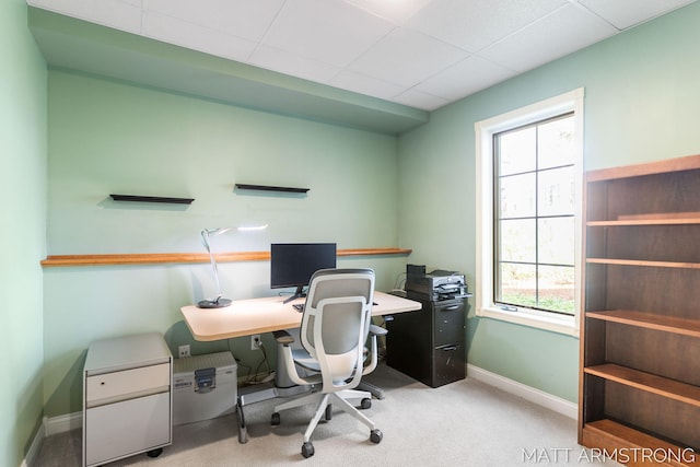 office area with baseboards and carpet