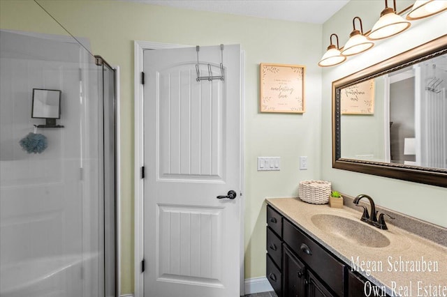 bathroom featuring vanity and walk in shower