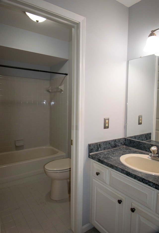 full bath featuring vanity, shower / tub combination, tile patterned floors, and toilet