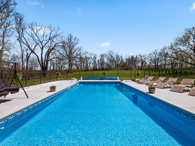 7136 N Meadows Trl, Dexter, MI 48130 - view of pool with fence, a fenced in pool, and a patio area