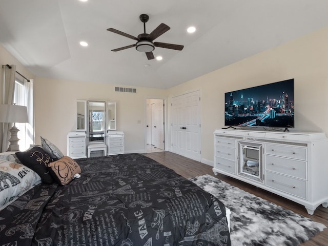 7136 N Meadows Trl, Dexter, MI 48130 - bedroom with visible vents, recessed lighting, wood finished floors, and vaulted ceiling