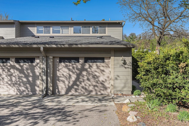 garage with driveway