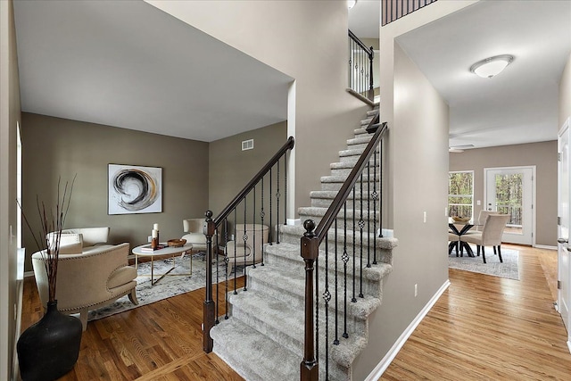 29816 Trailwood Dr, Warren, MI 48092 - stairway with wood finished floors, baseboards, and ceiling fan