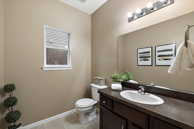 29816 Trailwood Dr, Warren, MI 48092 - bathroom featuring toilet, vanity, tile patterned floors, and baseboards