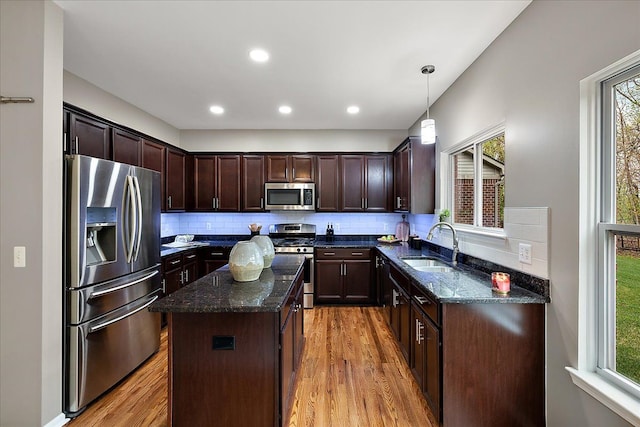 29816 Trailwood Dr, Warren, MI 48092 - kitchen with appliances with stainless steel finishes, light wood-style floors, plenty of natural light, and recessed lighting