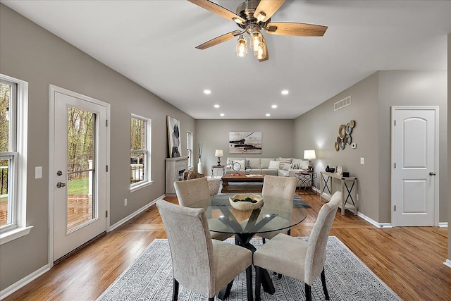 29816 Trailwood Dr, Warren, MI 48092 - dining space featuring plenty of natural light, baseboards, ceiling fan, light wood-type flooring, and recessed lighting