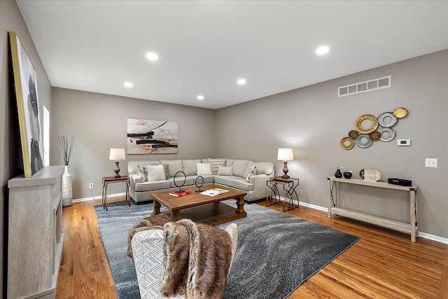 29816 Trailwood Dr, Warren, MI 48092 - living room with wood finished floors, baseboards, and recessed lighting