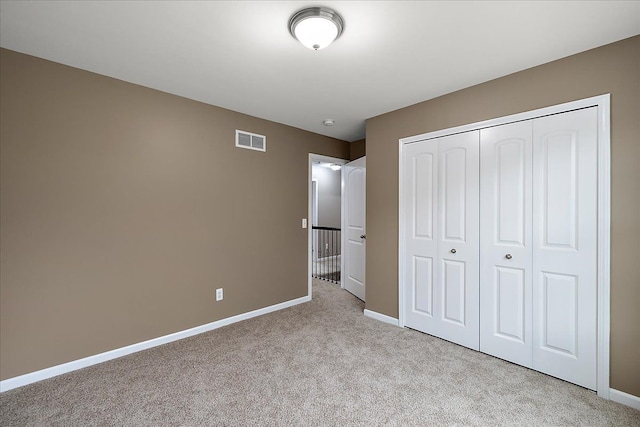 29816 Trailwood Dr, Warren, MI 48092 - unfurnished bedroom with carpet flooring, baseboards, and a closet