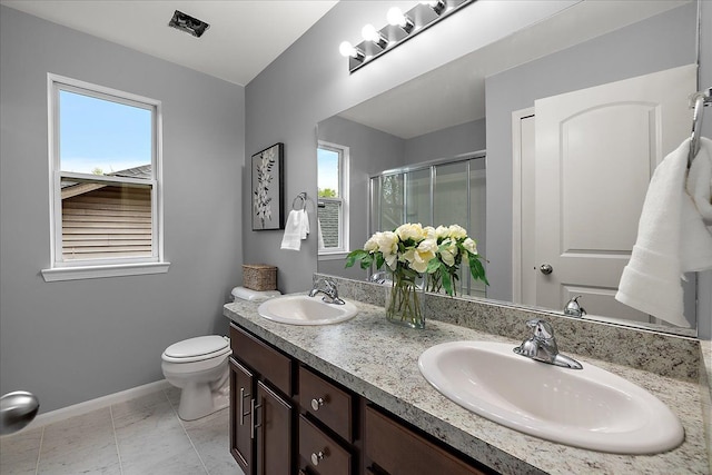 29816 Trailwood Dr, Warren, MI 48092 - bathroom featuring healthy amount of natural light, a stall shower, baseboards, and toilet