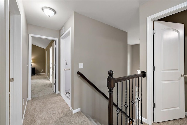 29816 Trailwood Dr, Warren, MI 48092 - hall featuring an upstairs landing, carpet flooring, and baseboards