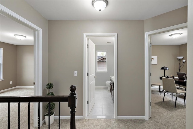 29816 Trailwood Dr, Warren, MI 48092 - corridor with light carpet, an office area, and baseboards