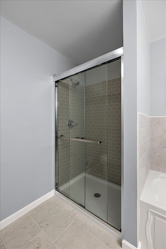 29816 Trailwood Dr, Warren, MI 48092 - bathroom with a stall shower, baseboards, and a garden tub