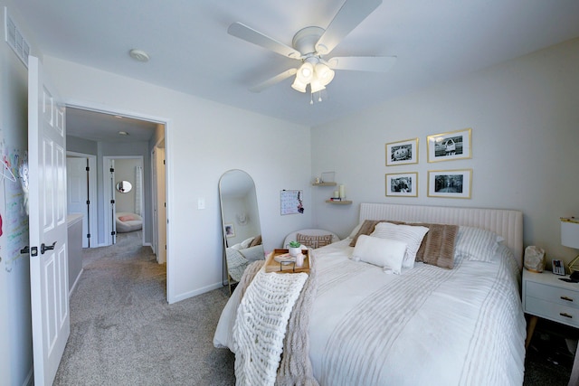 carpeted bedroom with a ceiling fan and visible vents