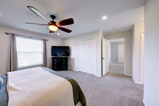 bedroom with carpet flooring, ceiling fan, recessed lighting, baseboards, and a closet