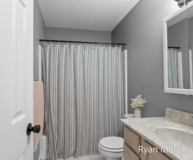 full bath with toilet, a textured ceiling, and vanity