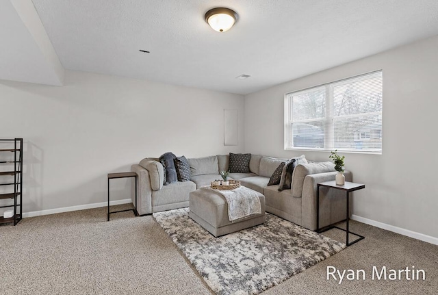 living area featuring baseboards and carpet flooring