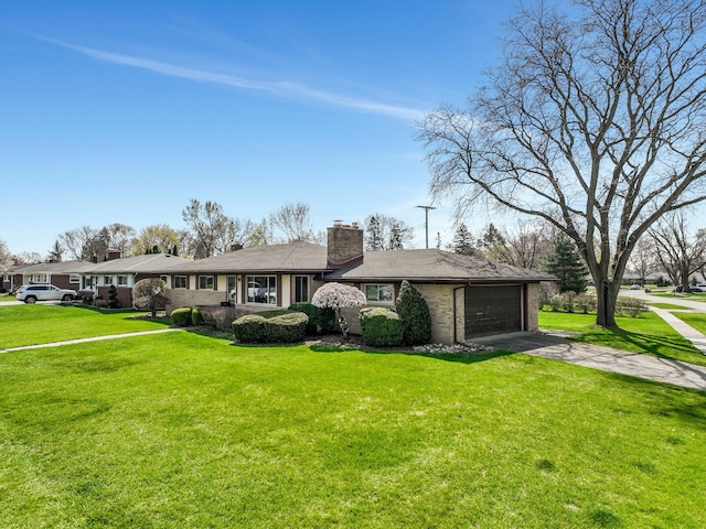 view of front of property featuring an attached garage, a front lawn, brick siding, a chimney, and driveway
