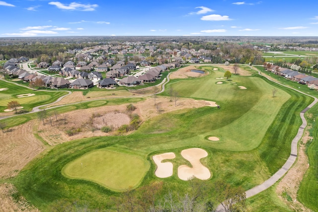 bird's eye view featuring view of golf course and a residential view