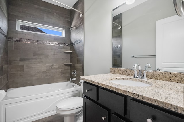 bathroom with vanity, shower / bathing tub combination, and toilet