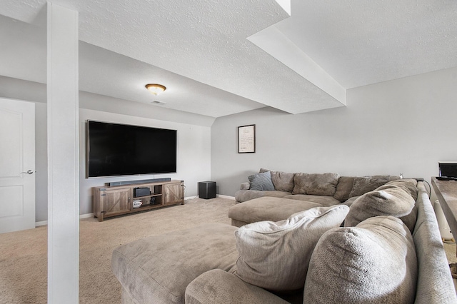 carpeted living area with a textured ceiling, baseboards, and visible vents