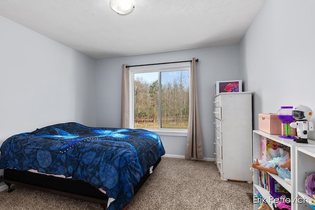 581 Cumings Ct NW, Sparta, MI 49345 - carpeted bedroom featuring baseboards