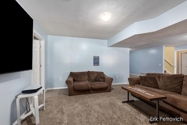 581 Cumings Ct NW, Sparta, MI 49345 - carpeted living room featuring visible vents, a textured ceiling, and baseboards