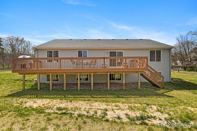 581 Cumings Ct NW, Sparta, MI 49345 - back of house featuring a yard, a wooden deck, and stairs