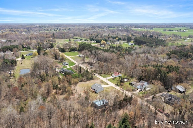 581 Cumings Ct NW, Sparta, MI 49345 - bird's eye view featuring a forest view