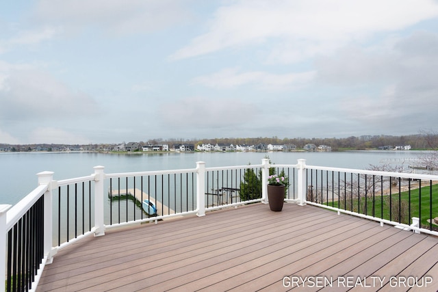 wooden deck with a water view