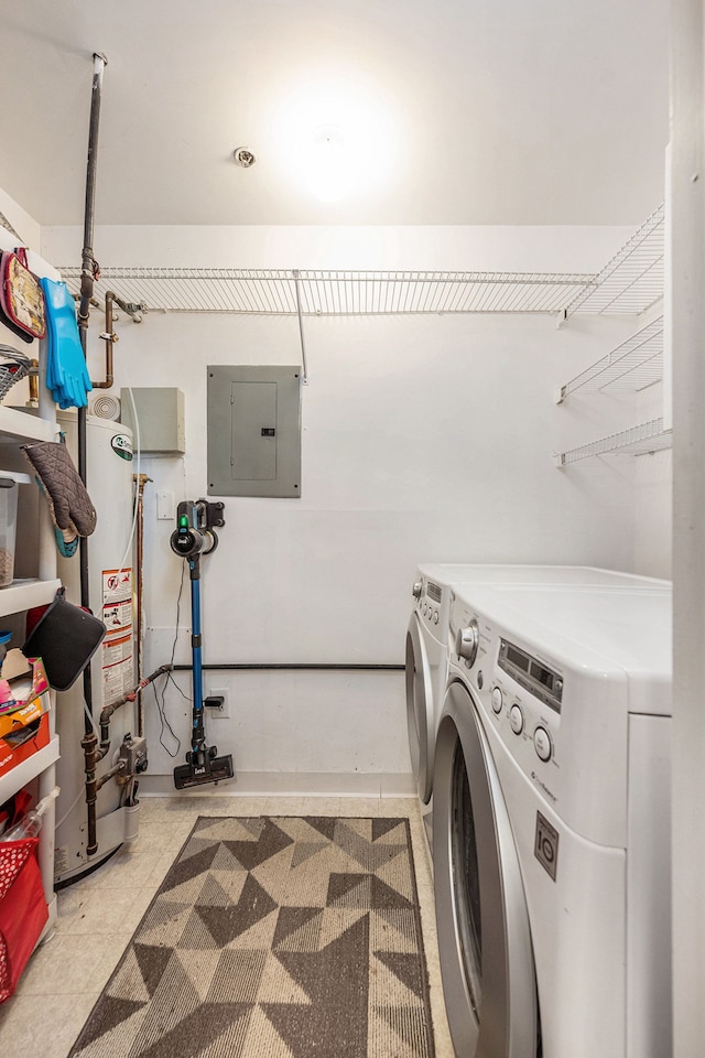 37510 Jefferson Ave Unit 203, Harrison Township, MI 48045 - clothes washing area featuring electric panel, washing machine and clothes dryer, and water heater