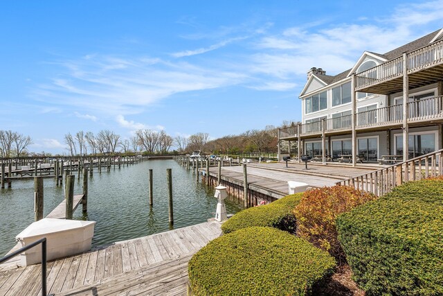 view of dock with a water view