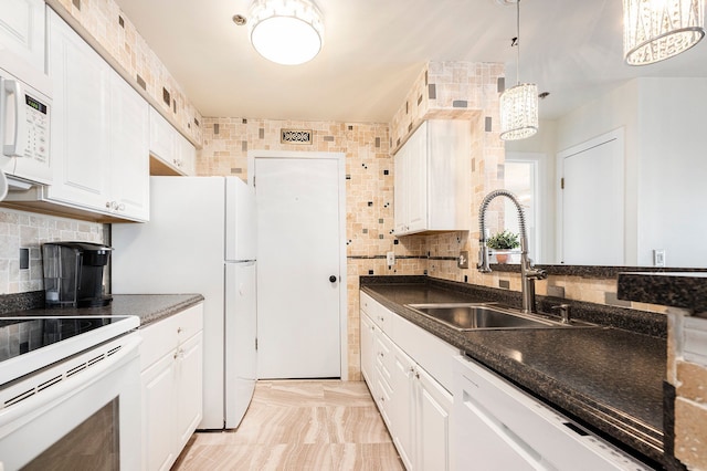 37510 Jefferson Ave Unit 203, Harrison Township, MI 48045 - kitchen with a sink, white appliances, dark countertops, and tasteful backsplash