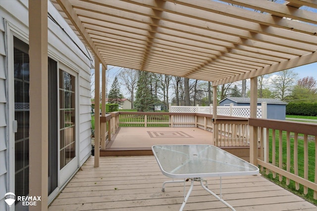 wooden terrace with a pergola