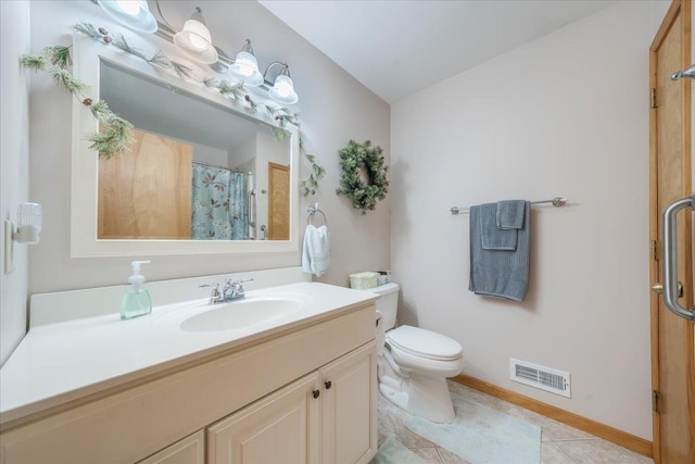 4335 Kings Corner Rd, Glennie, MI 48737 - full bath with visible vents, tile patterned flooring, vanity, baseboards, and toilet
