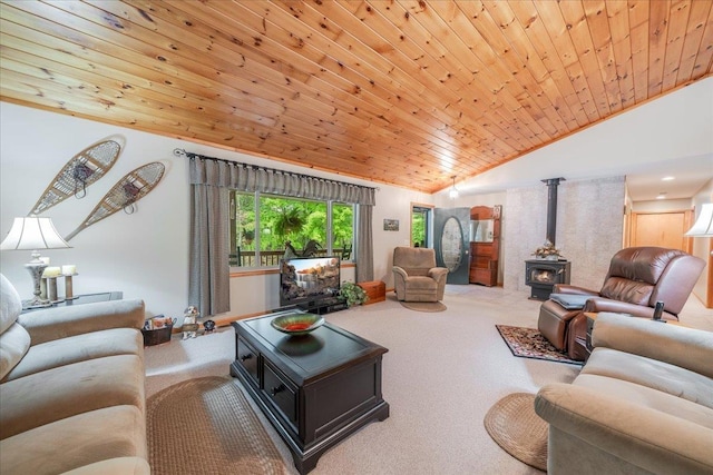 4335 Kings Corner Rd, Glennie, MI 48737 - carpeted living area with wood ceiling, a wood stove, and vaulted ceiling