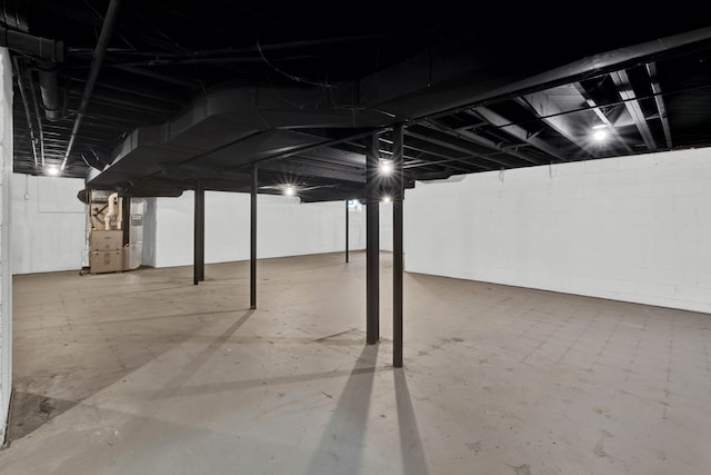 unfinished basement with heating unit