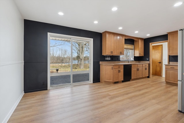 711 Sylvanwood Dr, Troy, MI 48085 - kitchen featuring a wealth of natural light, light wood finished floors, and dishwasher