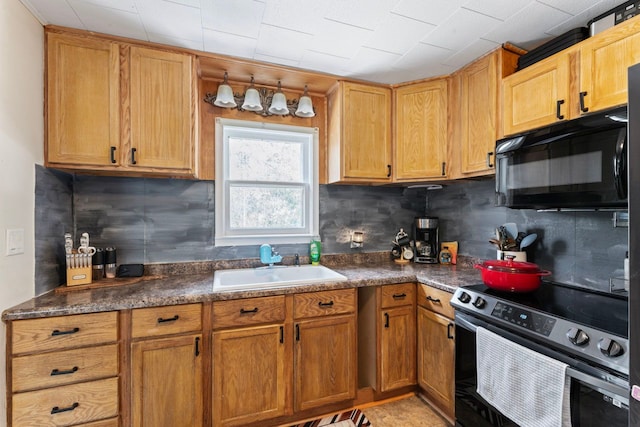 8119 N Dort Hwy, Mount Morris, MI 48458 - kitchen with black microwave, dark countertops, stainless steel electric range, a sink, and backsplash