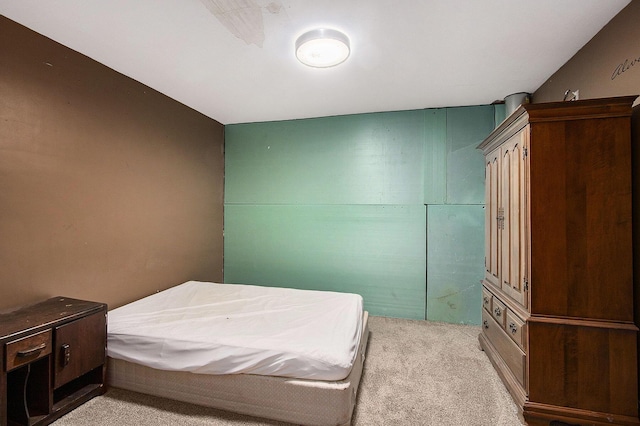bedroom with light colored carpet