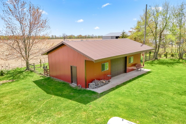 8531 S Waldron Rd, Pittsford, MI 49271 - back of property featuring a lawn and metal roof