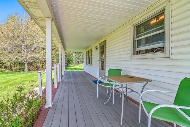 8531 S Waldron Rd, Pittsford, MI 49271 - deck with a lawn and covered porch