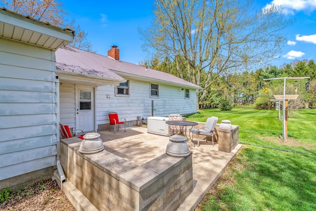 8531 S Waldron Rd, Pittsford, MI 49271 - wooden terrace featuring a yard and a patio area