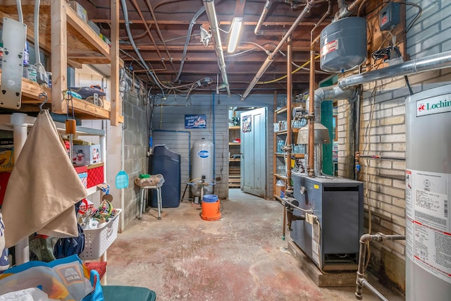 8531 S Waldron Rd, Pittsford, MI 49271 - unfinished basement with a heating unit and water heater